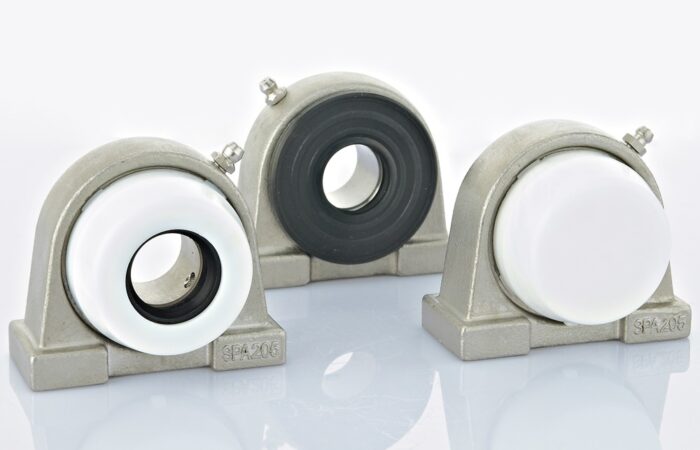 Stainless steel SPA 2 holes spherical pillow block bearing units with plastic caps
